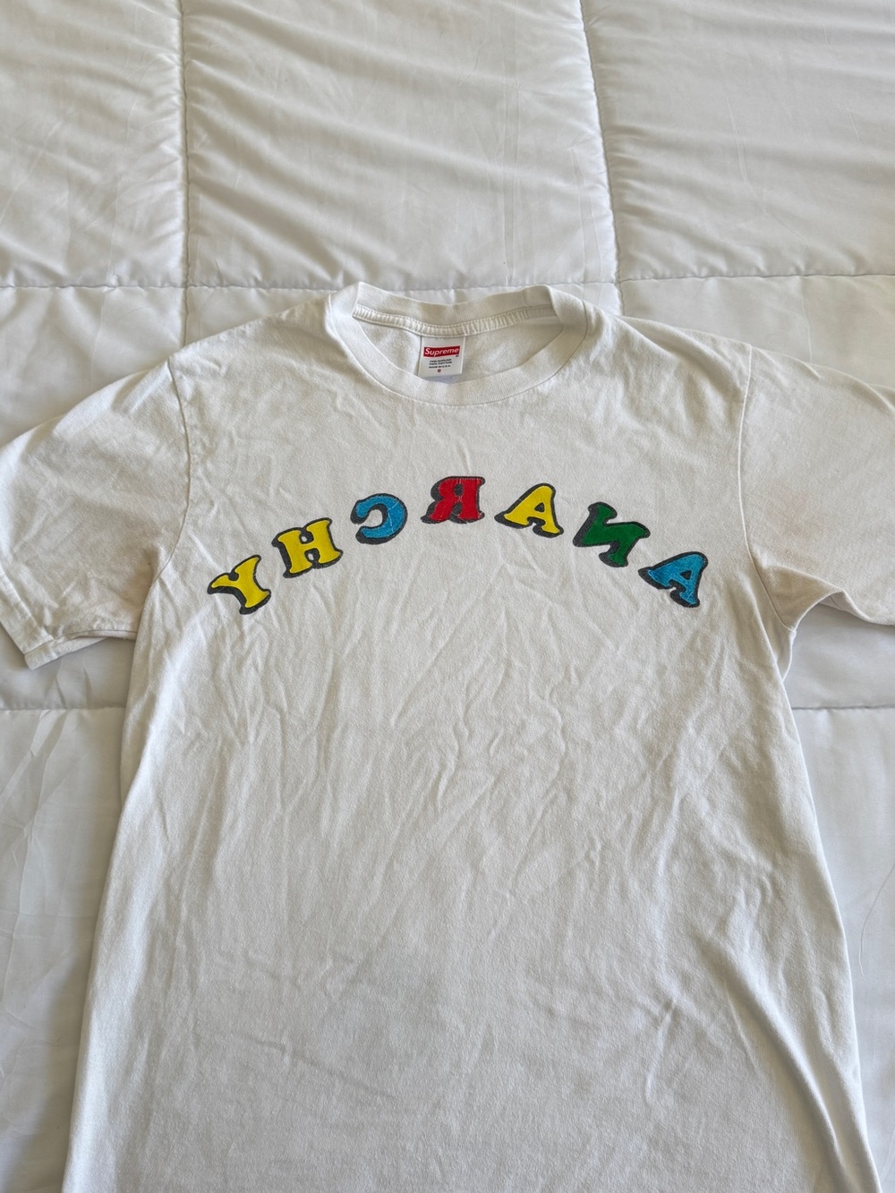 Supreme White Kids Tee with Multicolor 'ANARCHY' Arch Logo